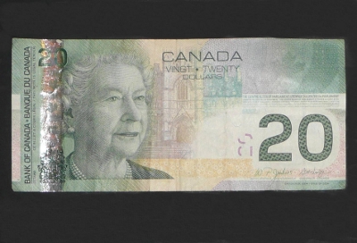 $20 bill hides invisible watermarks and threads